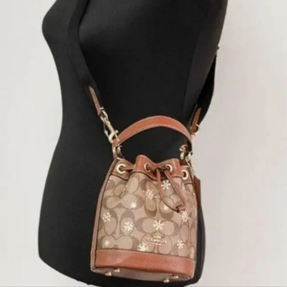 COACH Dempsey Drawstring Bucket Bag 15 In Signature Canvas and Pebbled Leather